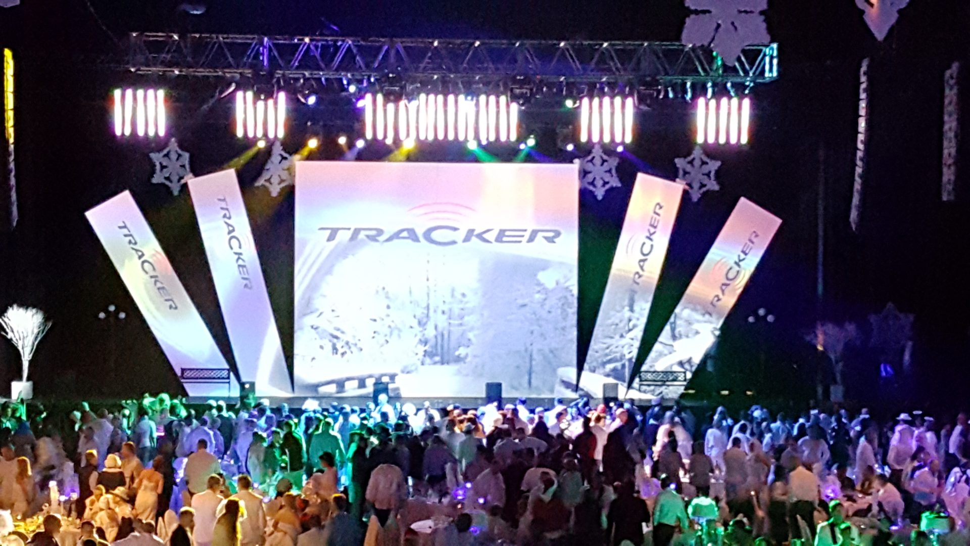 Live floor — guests facing the Tracker stage