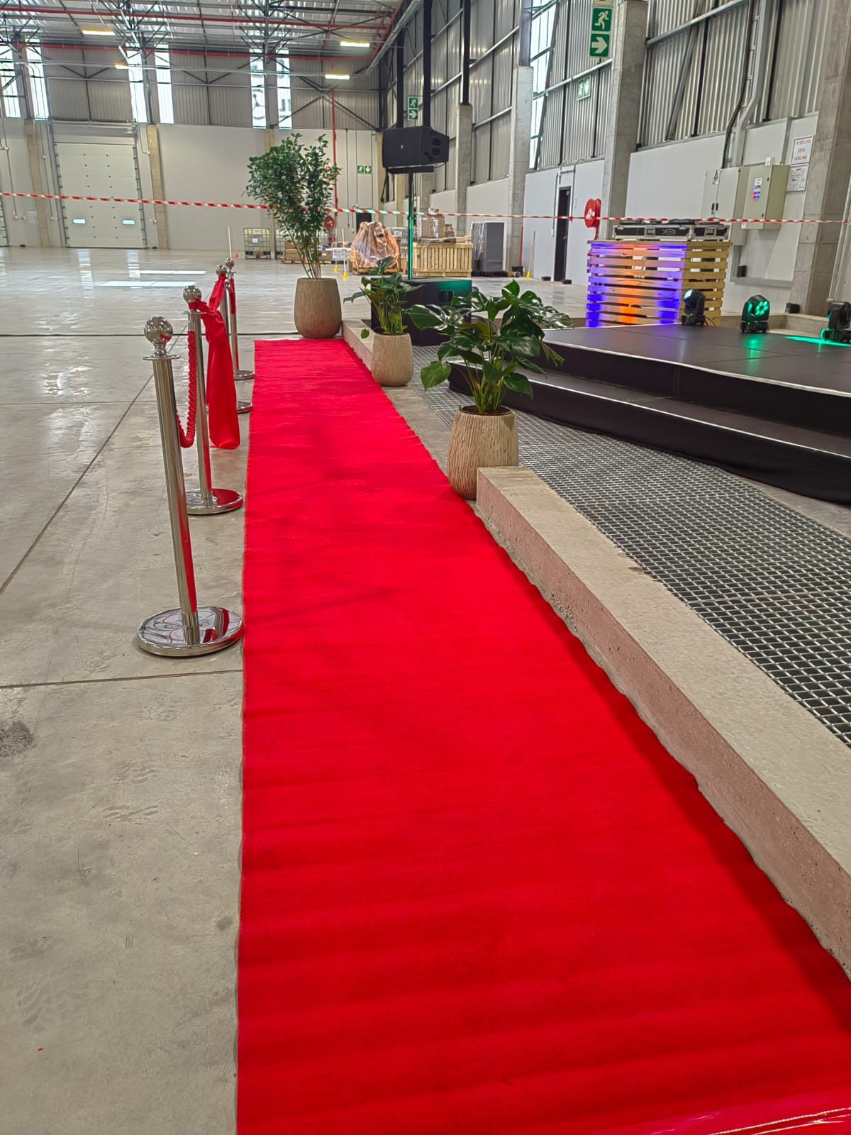 Red-carpet runner leading to the stage